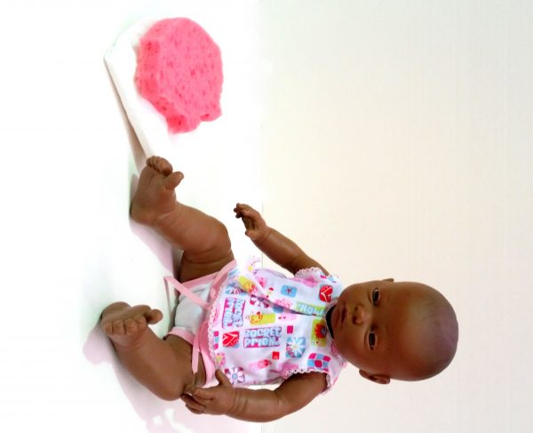 NEWBORN DRESSED AFRICAN GIRL