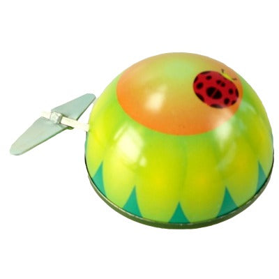 Tin toy – windup Little ladybug on flower
