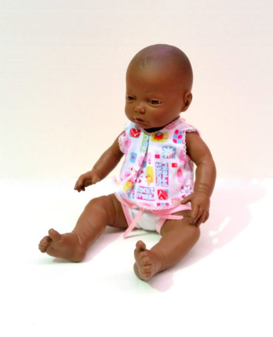 NEWBORN DRESSED AFRICAN GIRL